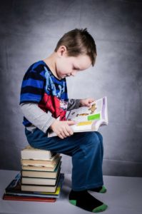 Child Reading Books Agape House of Prescott